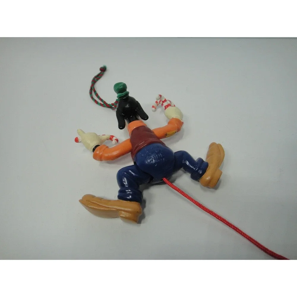 Disney Goofy Jumping Jack Christmas Ornament Pull String Candy Cane Figure VTG